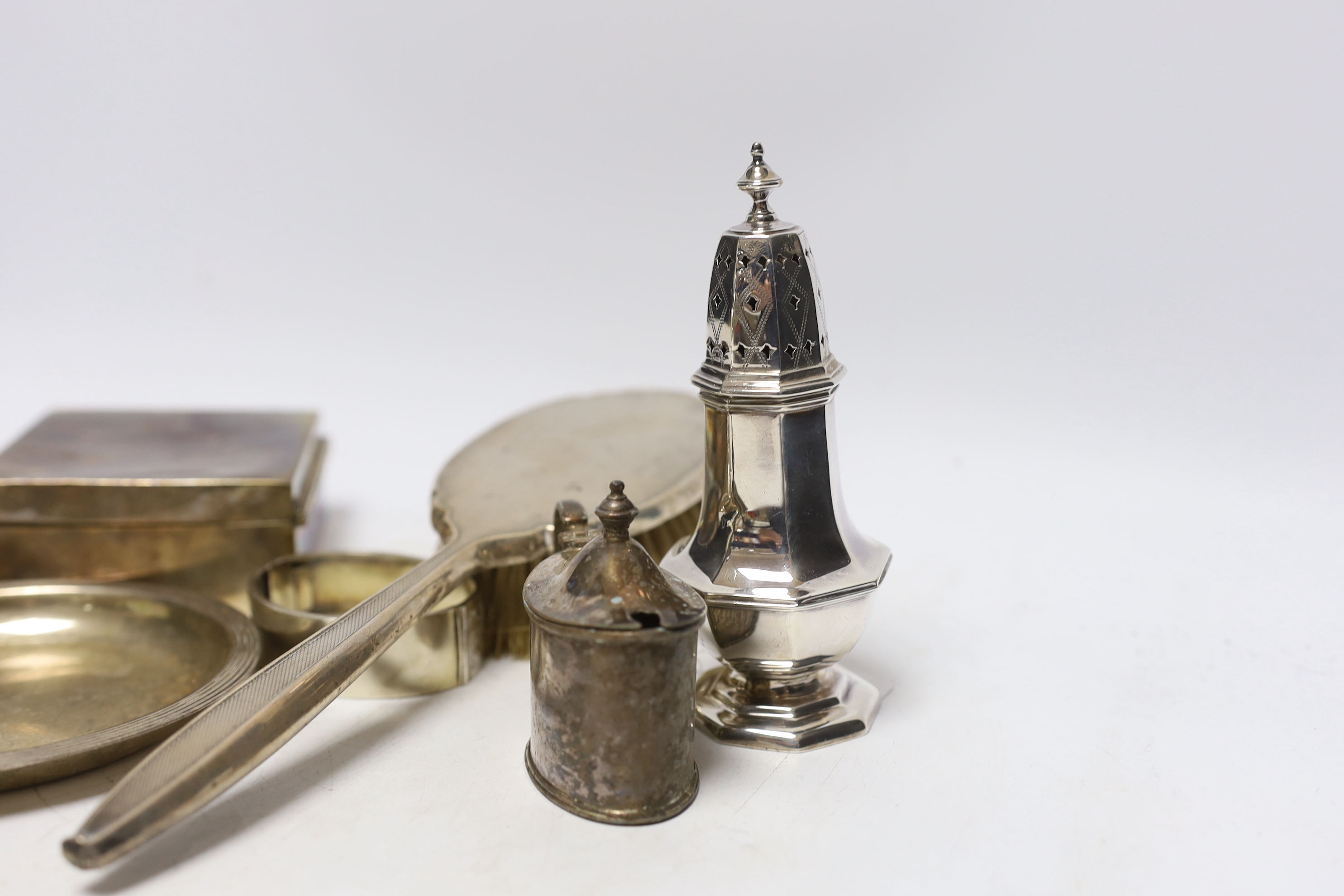 Sundry silver including a mounted hair brush, cigarette box, small dish, bangle, caster and mustard.